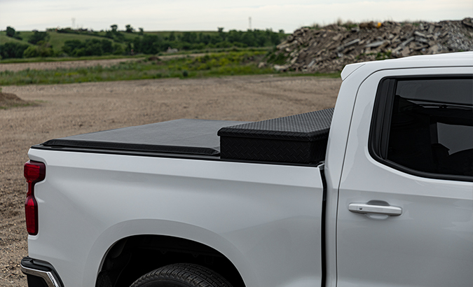 Access toolbox roll clearance up tonneau cover